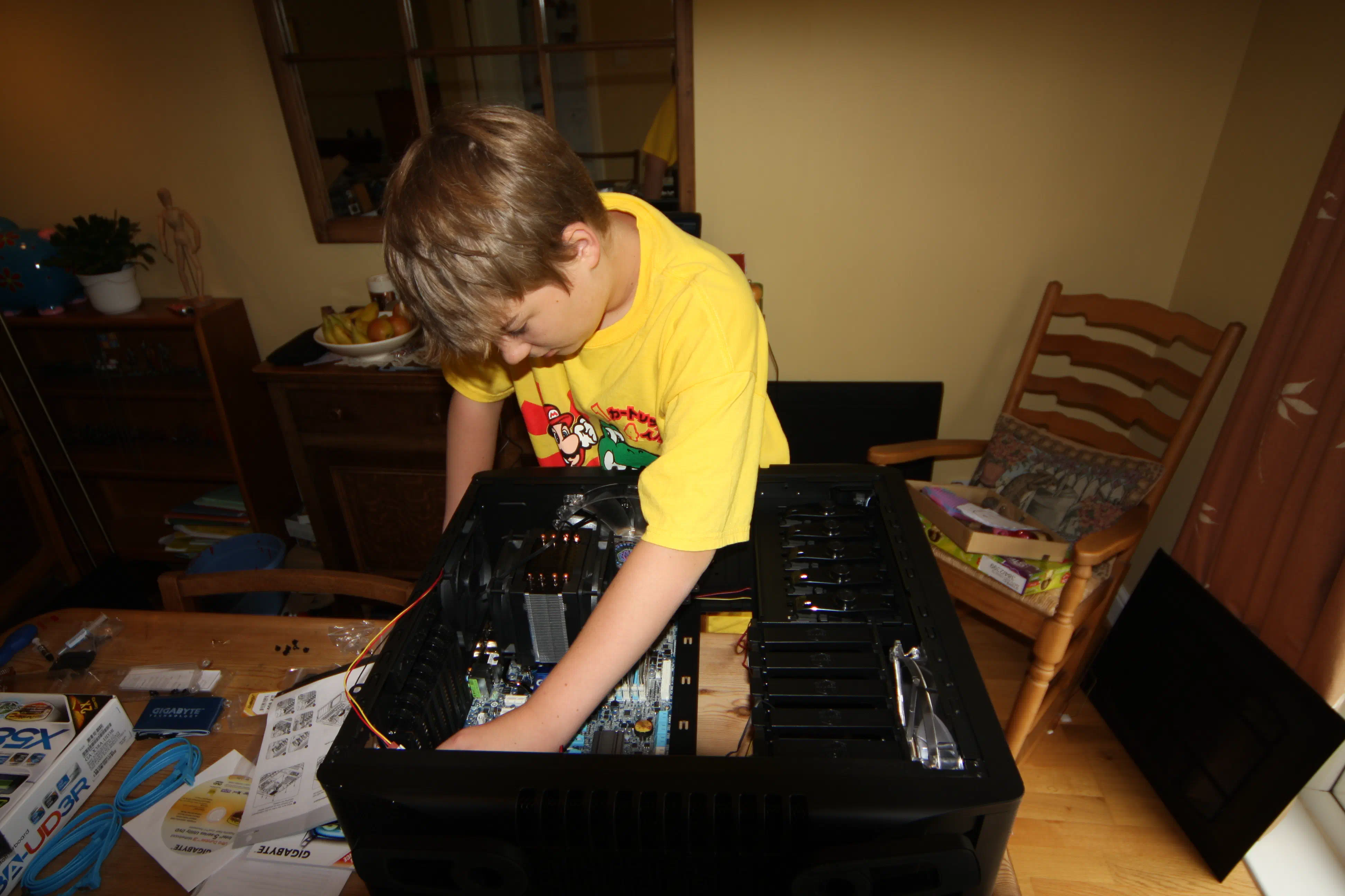 A young me assembling a PC