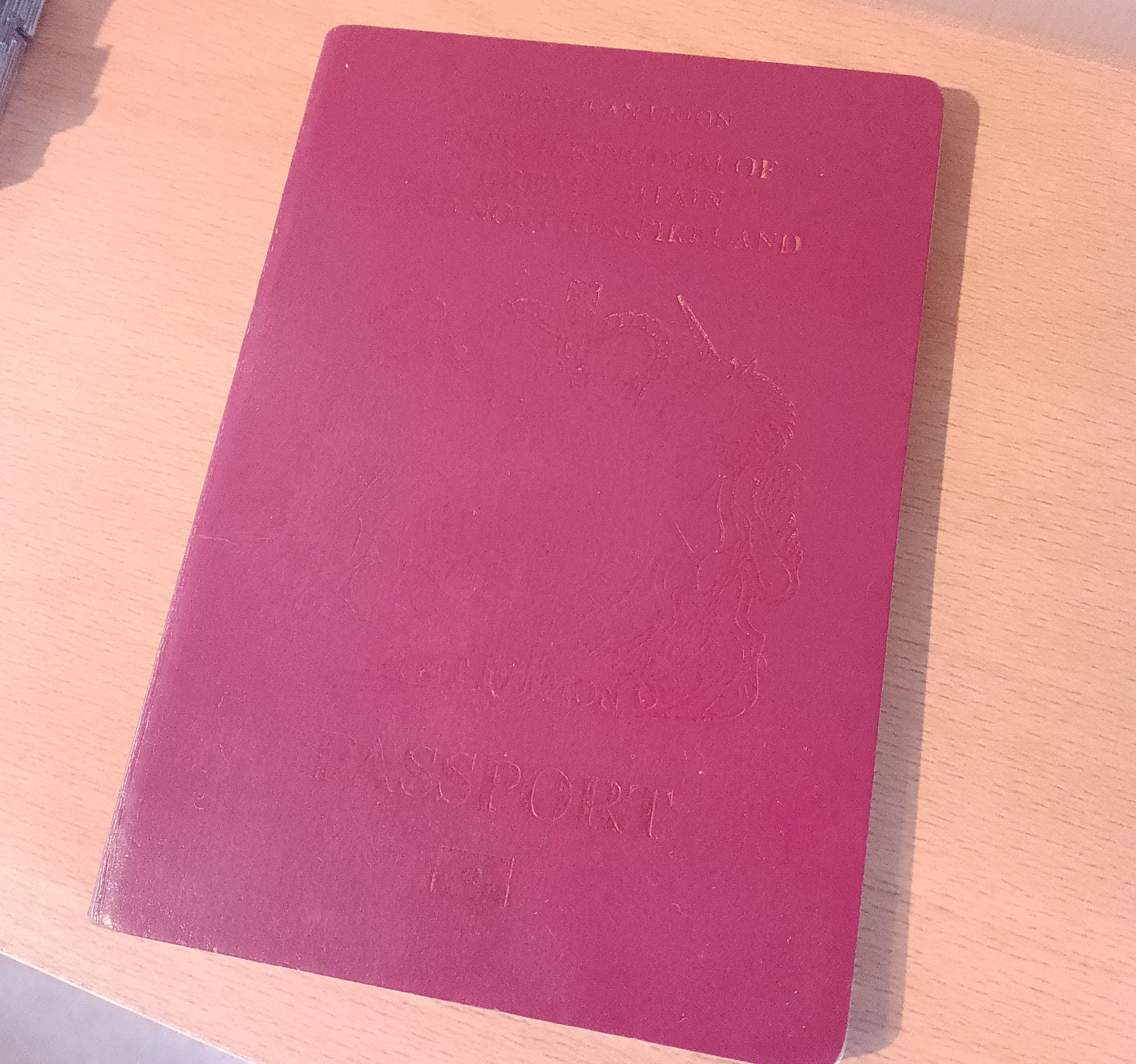 Cover of a worn British passport
