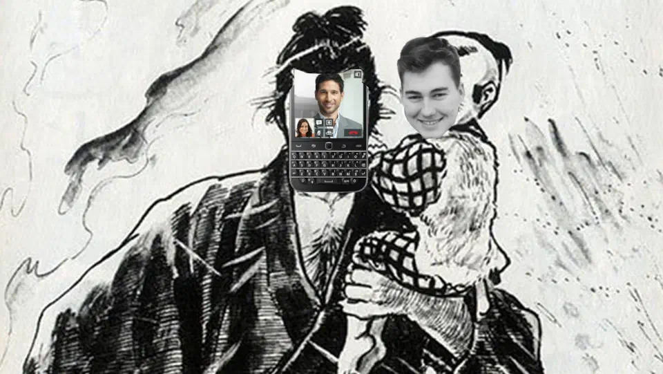 A man with a BlackBerry Classic for a face holding a baby with my face