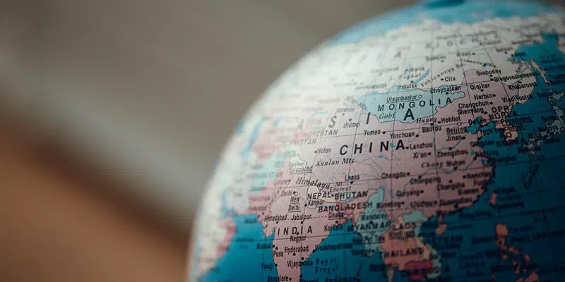 Close up of a desk globe, centered on China