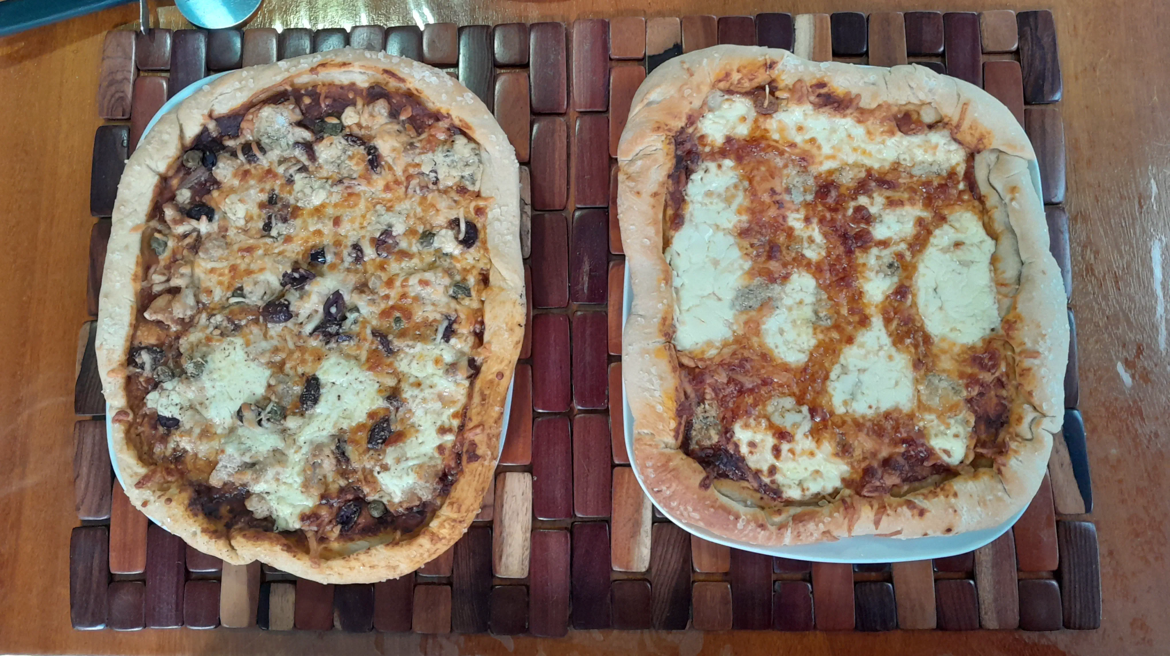 Two pizzas on a tray