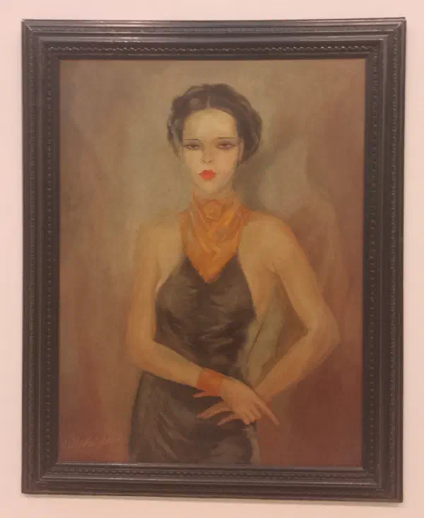 An elegantly-dressed woman with pursed red lips and sarcastic eyes