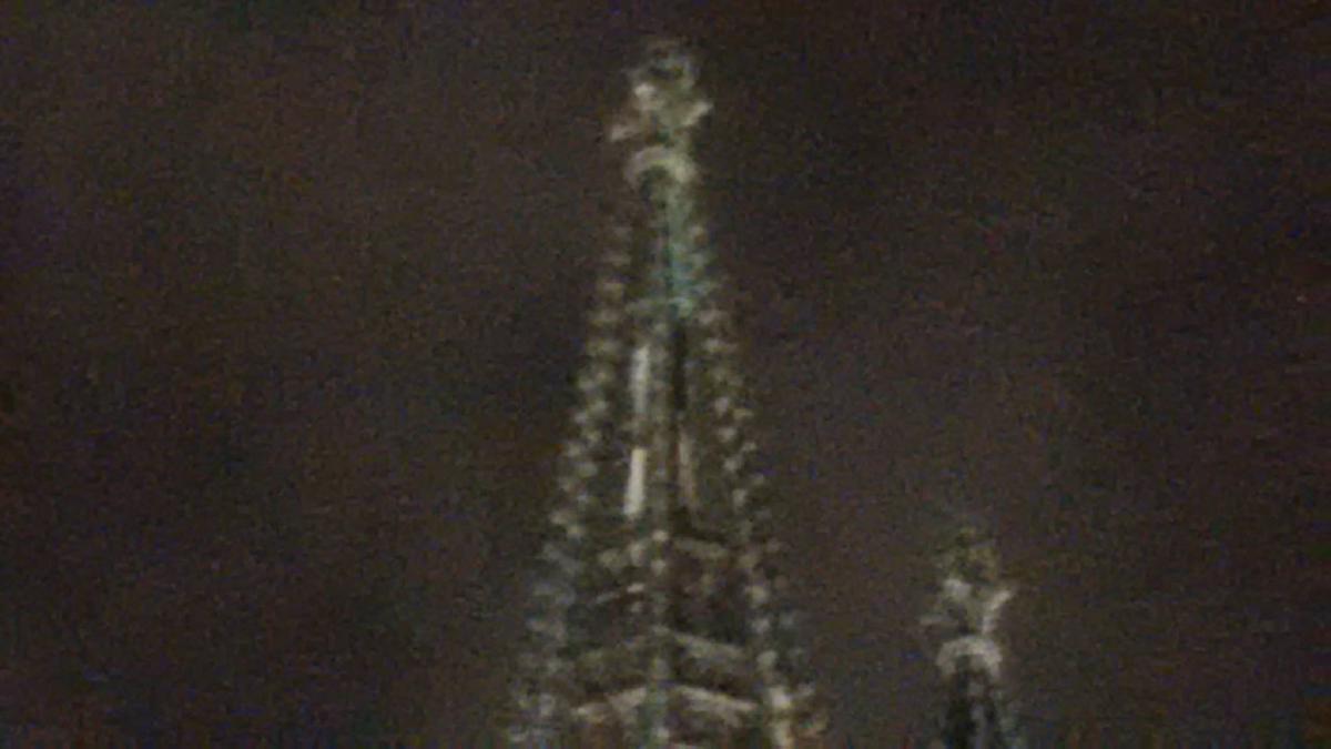 Detail of the Cologne Cathedral spire, highlighting an external ladder at the top