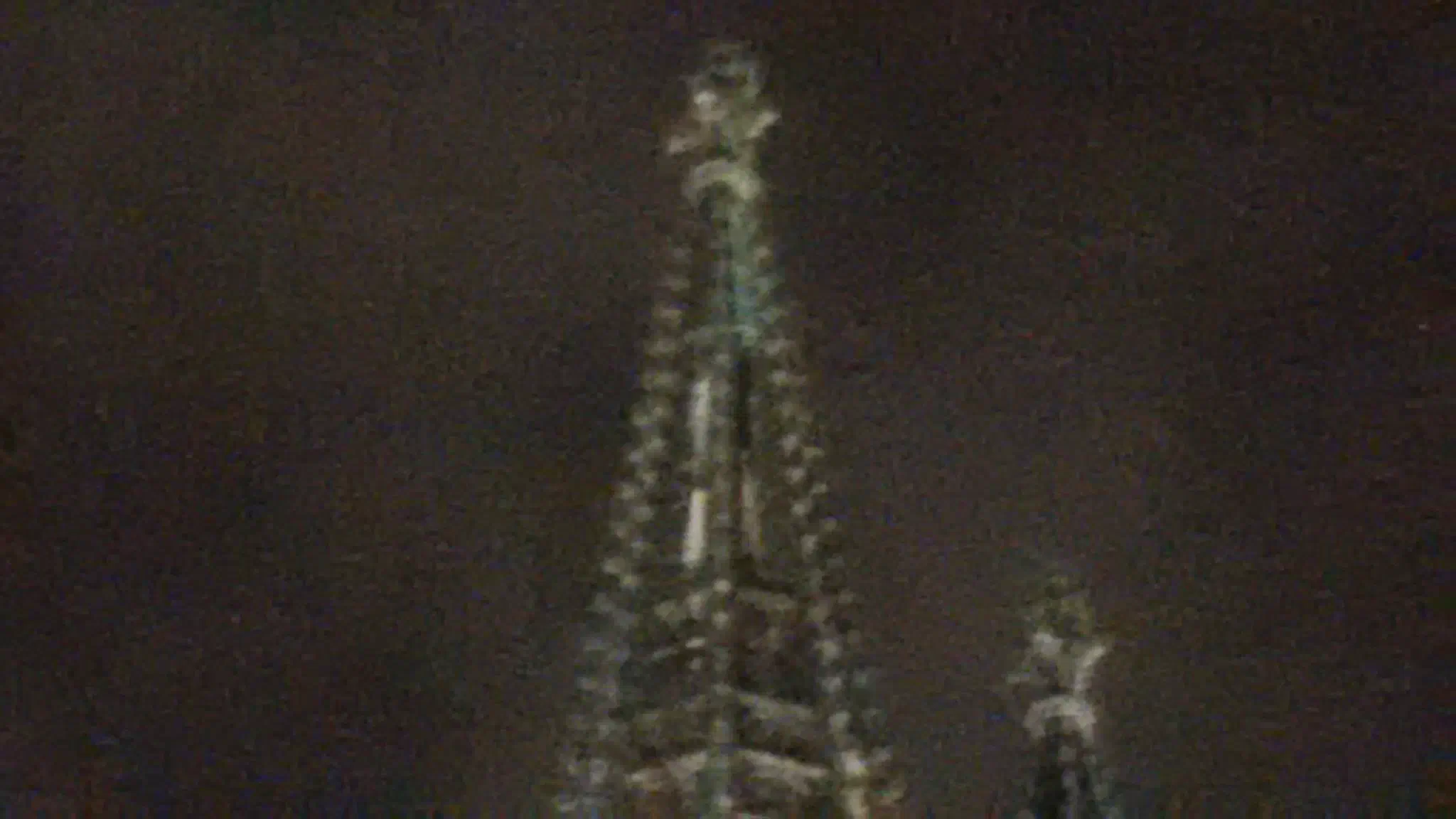 Detail of the Cologne Cathedral spire, highlighting an external ladder at the top