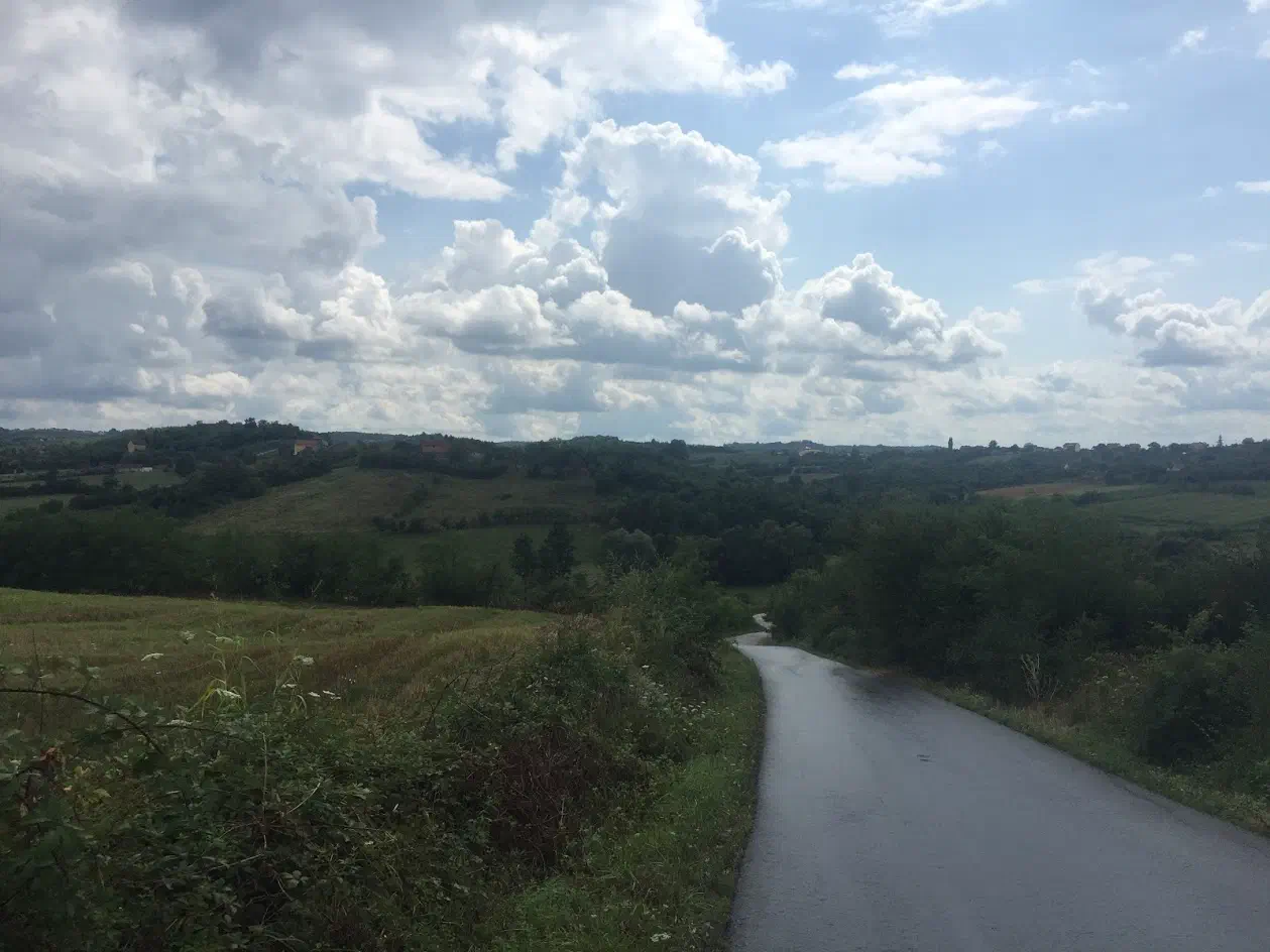 A road stretching off into the distance over several hills