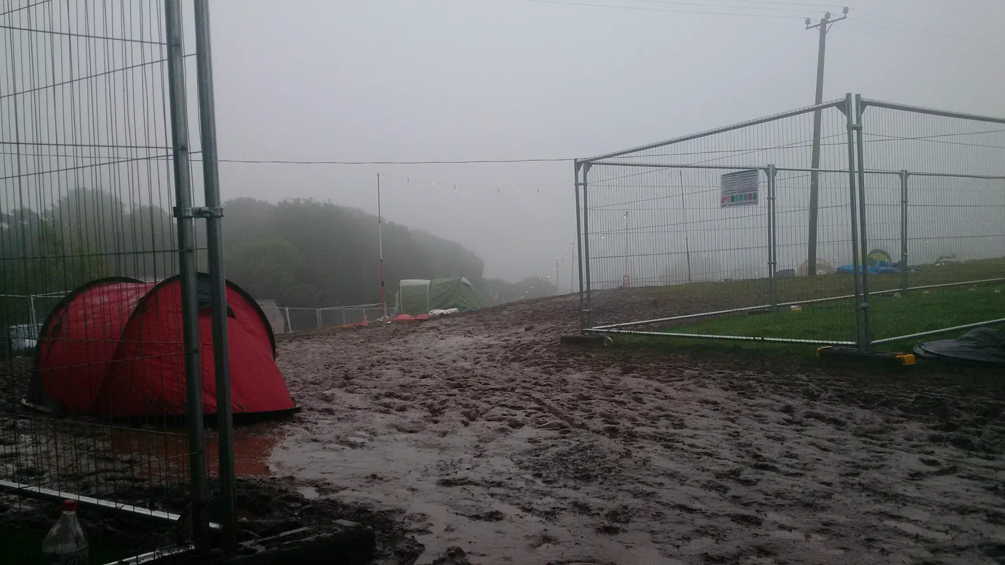 A festival campsite covered in fog