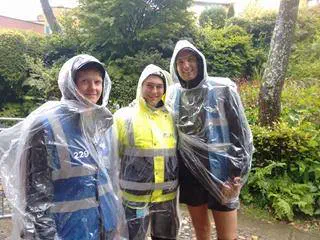 Three guys wearing waterproofs