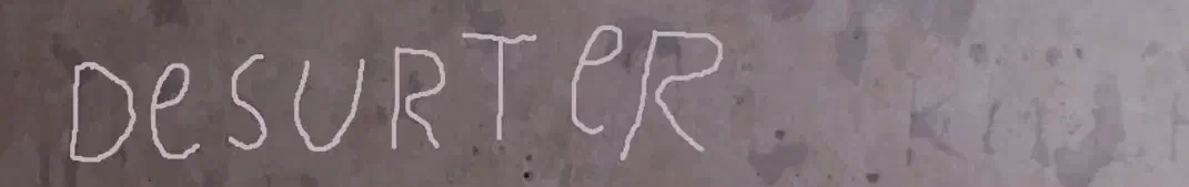 A castle wall with an engraving highlighted reading 'desurter [sic]'