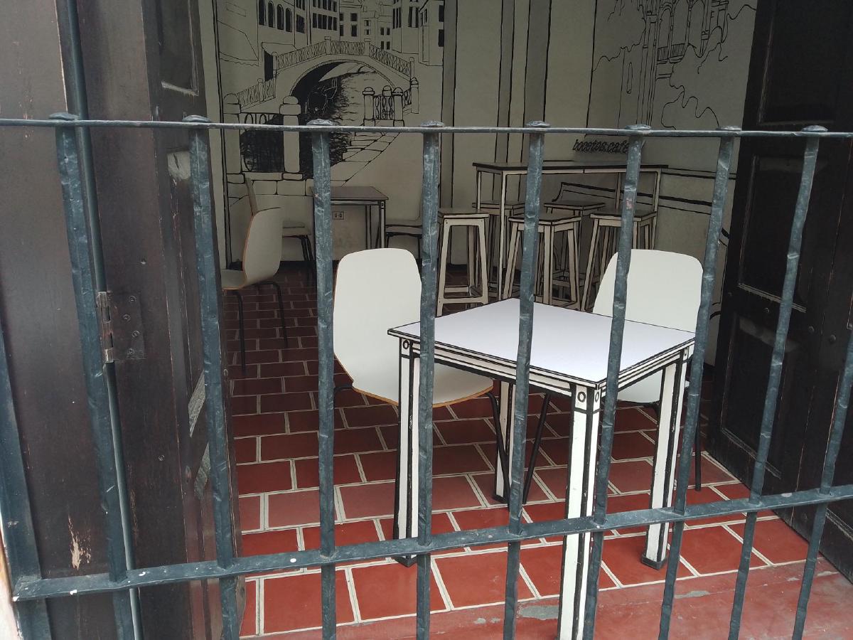 A café with furniture painted to resemble a comic book