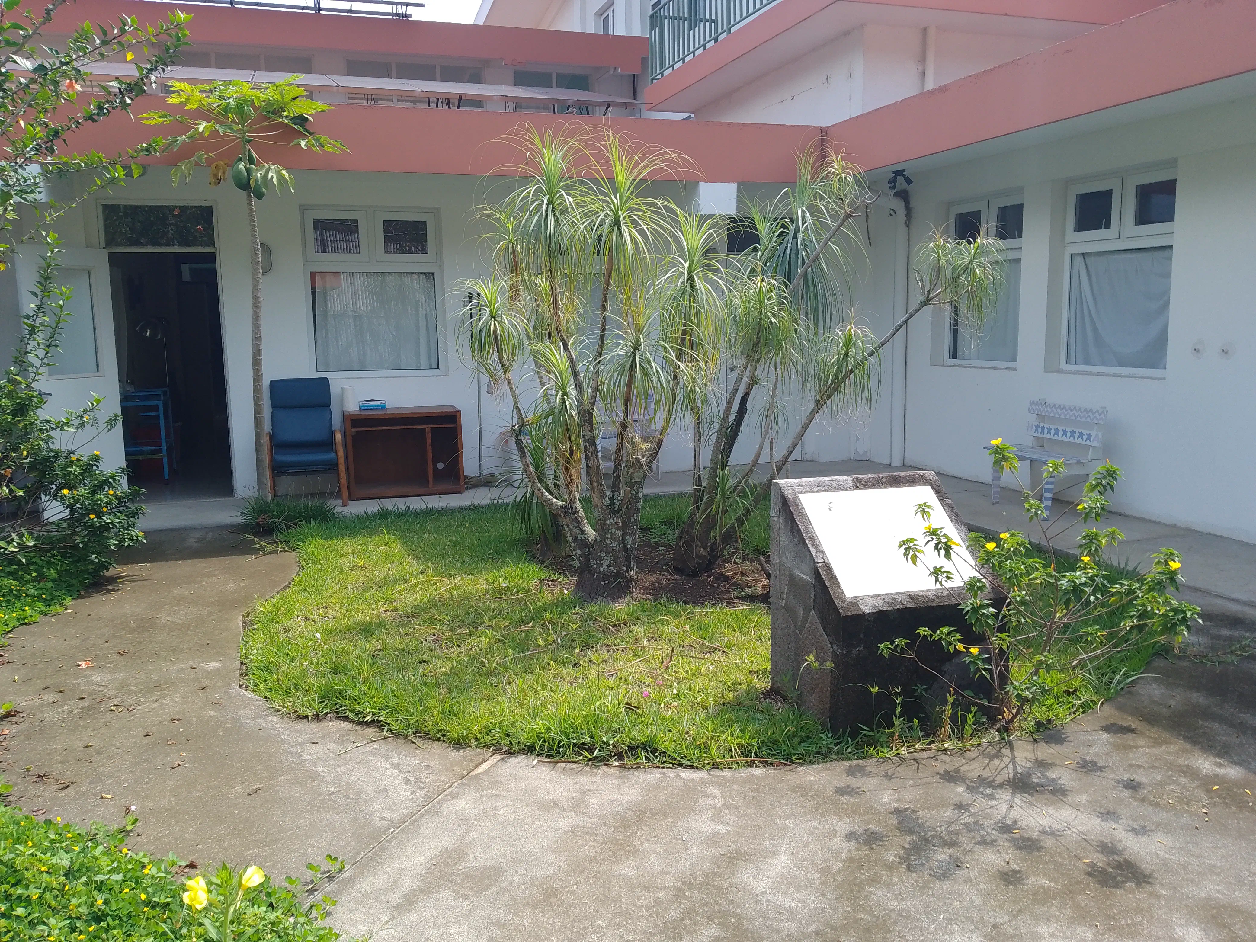 A garden with a circular patio