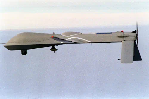 Predator Unmanned Aerial Vehicle (UAV) flies on a simulated Navy aerial reconnaissance flight near the aircraft carrier USS Carl Vinson (CVN 70) off the coast of southern California on Dec. 5, 1995.