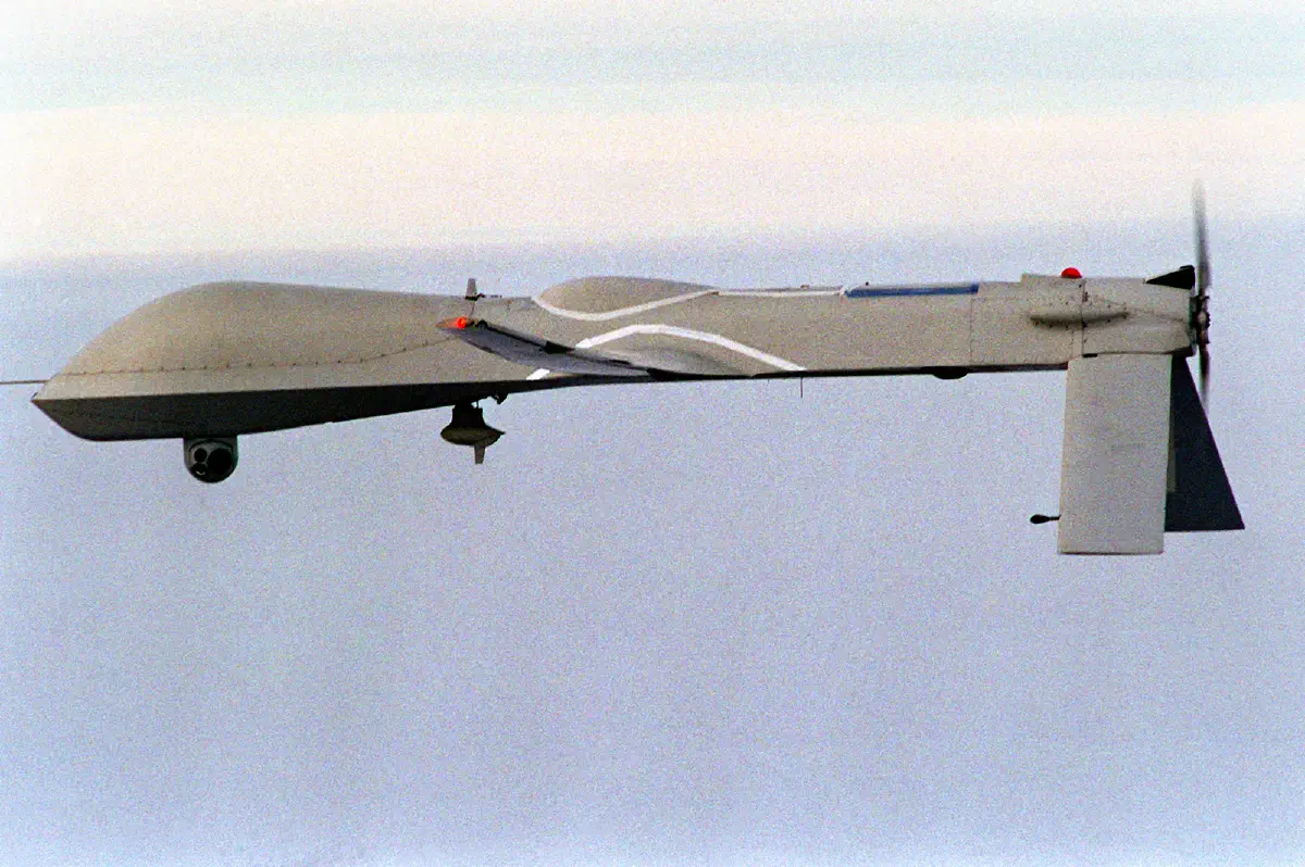 Predator Unmanned Aerial Vehicle (UAV) flies on a simulated Navy aerial reconnaissance flight near the aircraft carrier USS Carl Vinson (CVN 70) off the coast of southern California on Dec. 5, 1995.