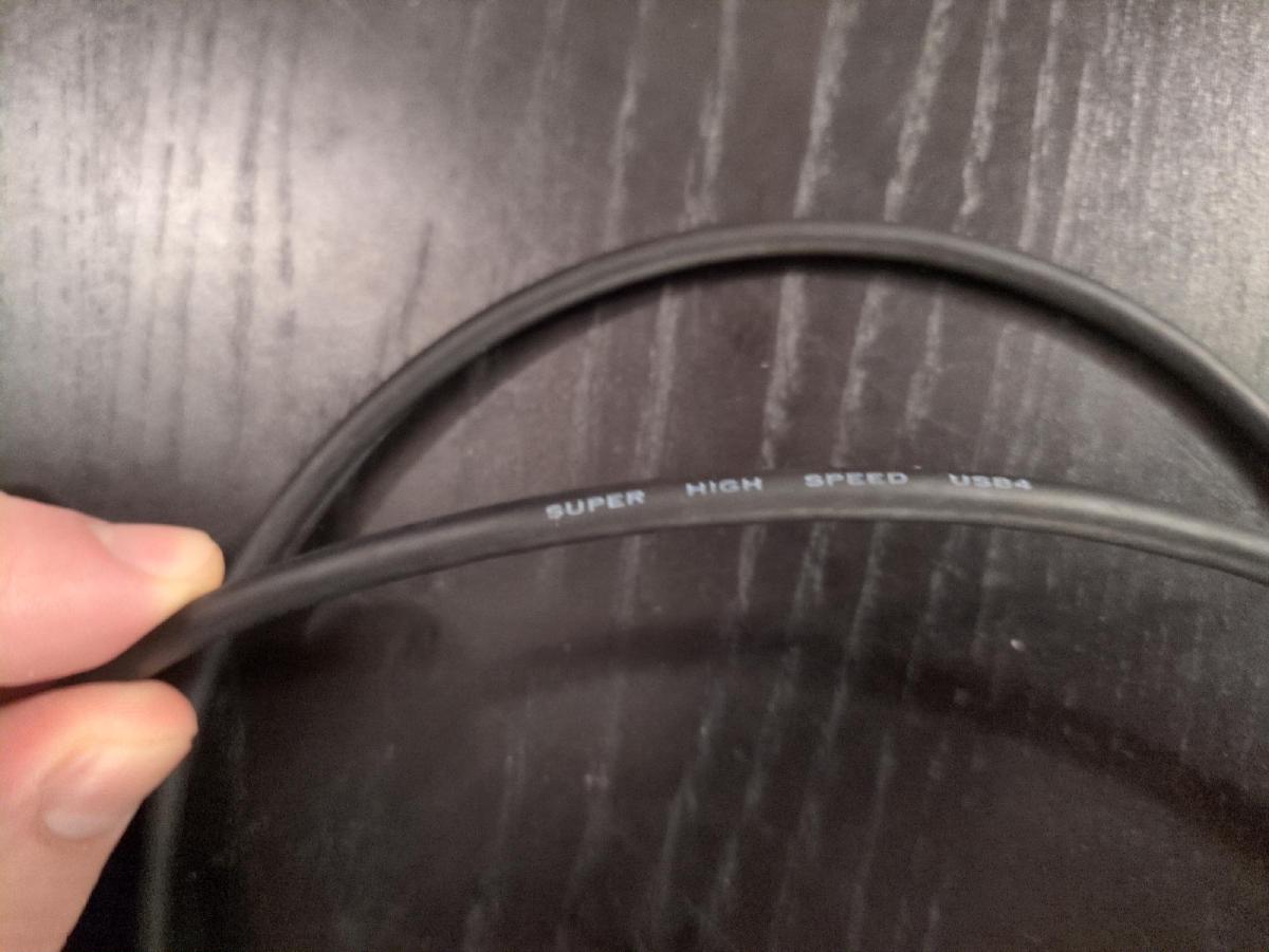 A cable reading {{< q >}}Super High Speed {{< abbr 