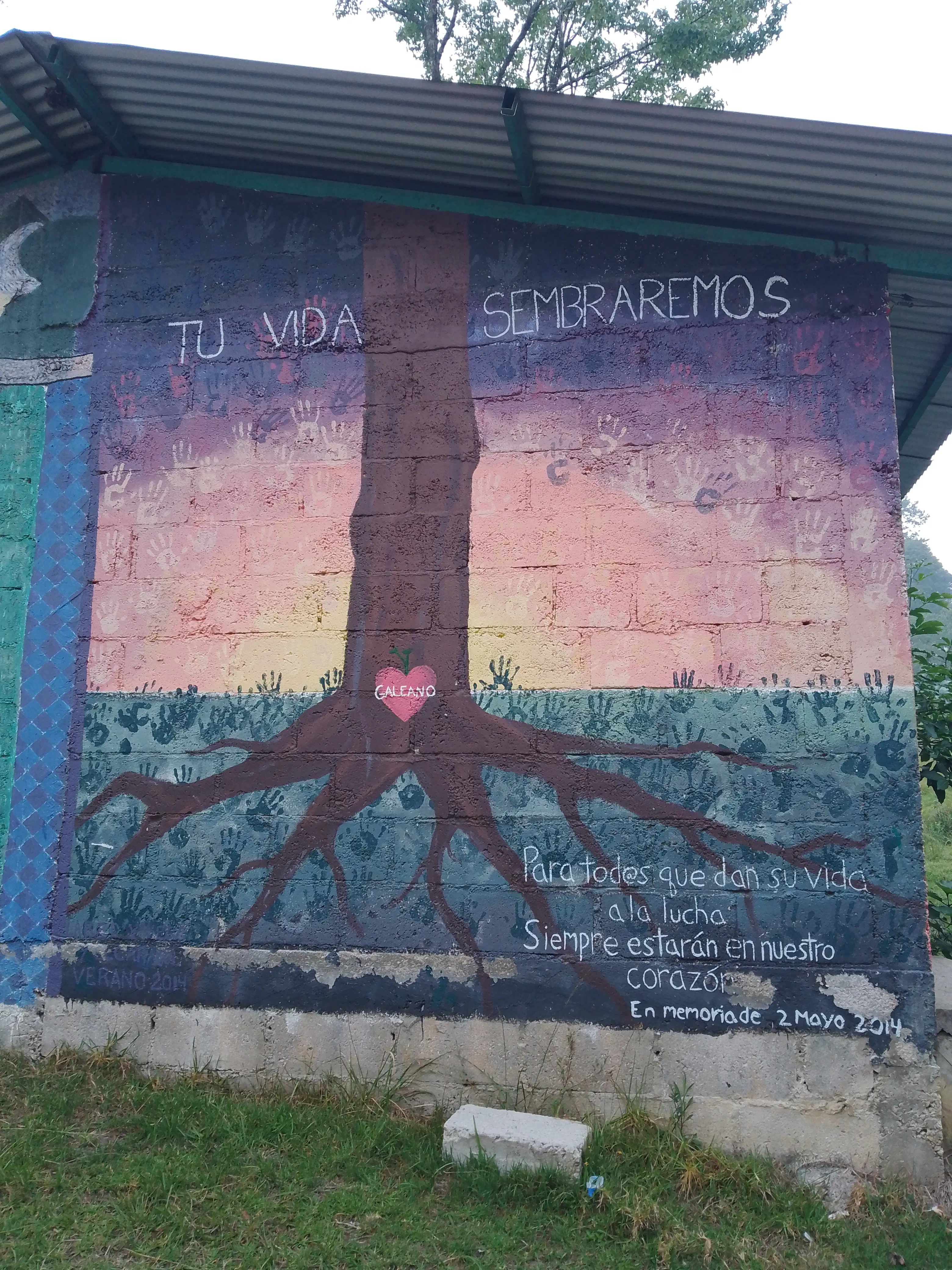 Mural of a tree with a heart at its base