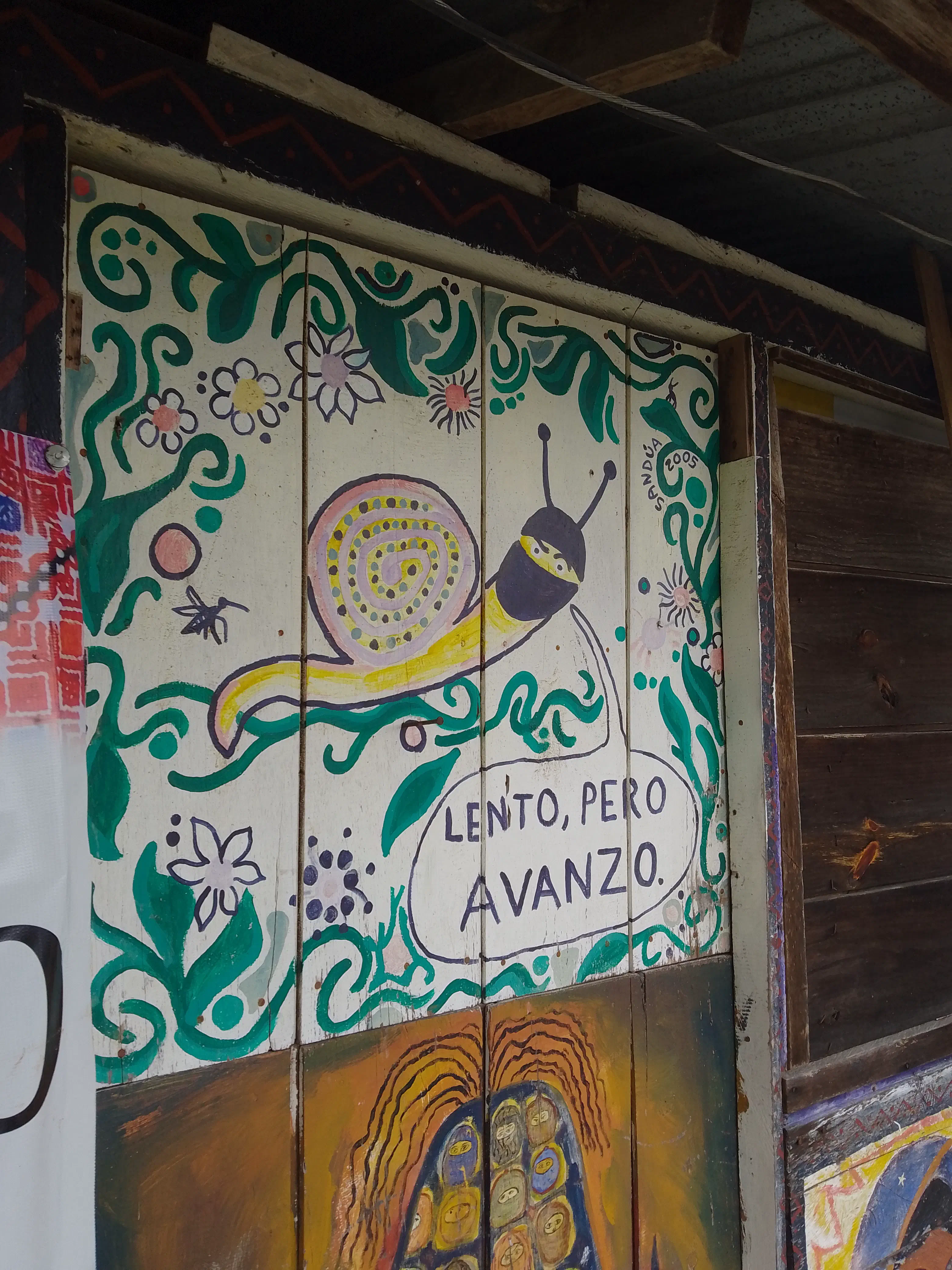 Mural of snail wearing a ski mask