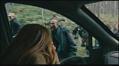 People attacking a car