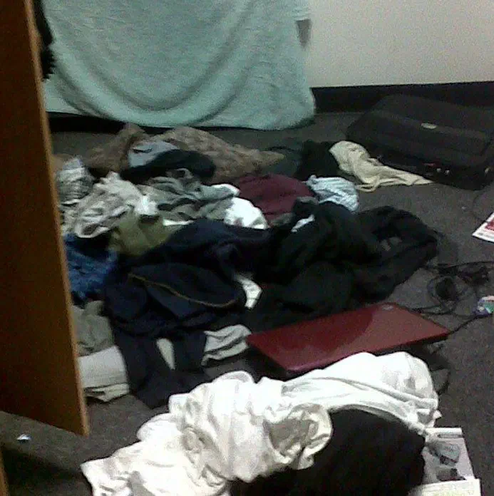 My bedroom floor, covered in clothes