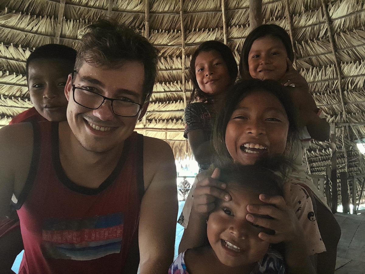 The author and a group of smiling children