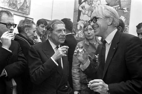 Arthur Koestler drinking with others