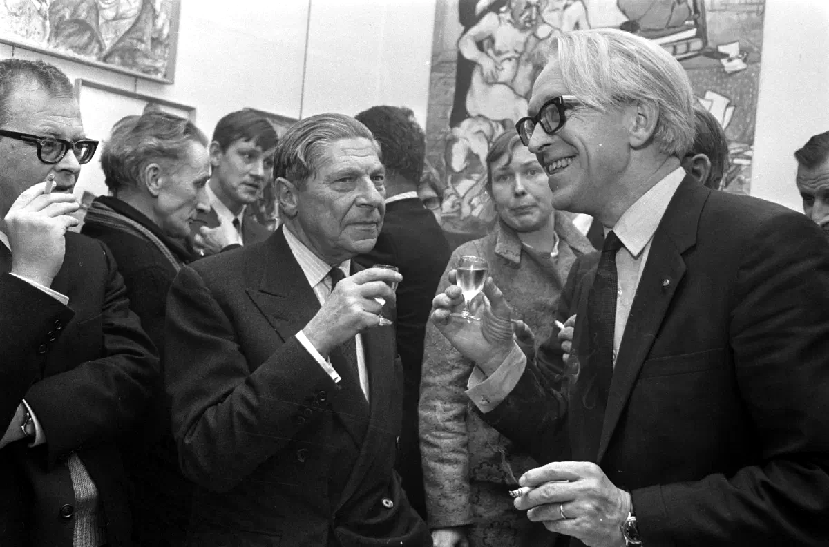 Arthur Koestler drinking with others