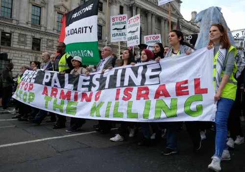 Palestine solidarity protesters march towards the British parliament on 5 June 2018.