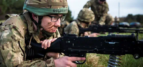 The author firing a GPMG