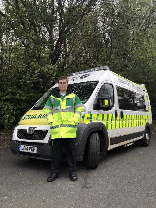 The author in front of an ambulance
