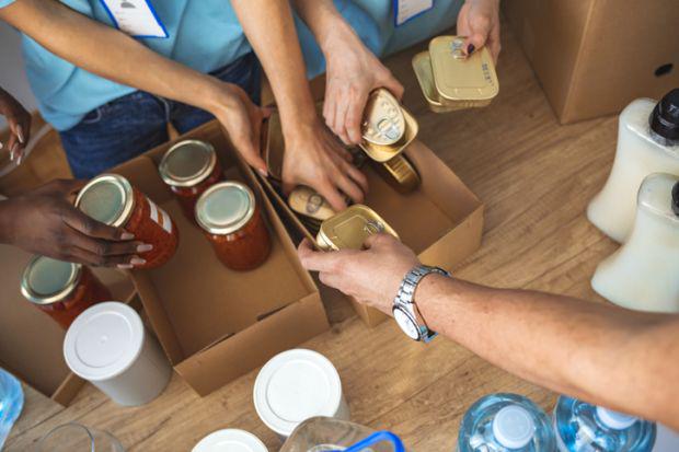 Volunteers peparing food packages