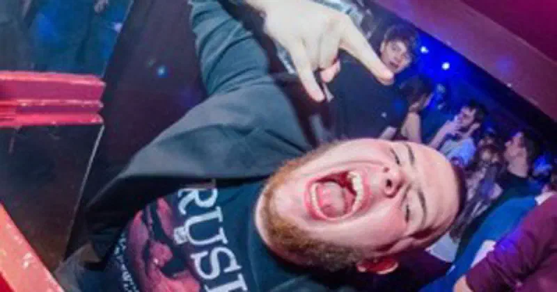 A man screaming in a nightclub