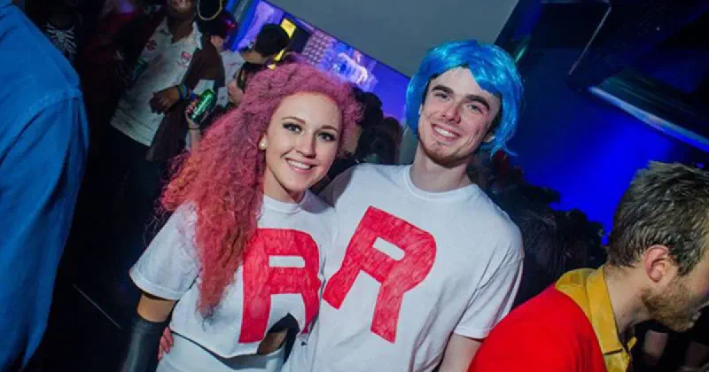 A couple dressed as Team Rocket