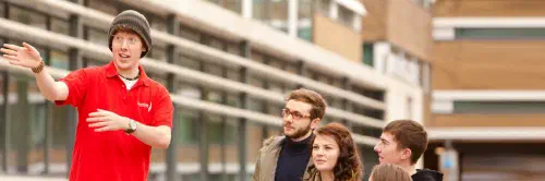 Tour guides leading a university tour