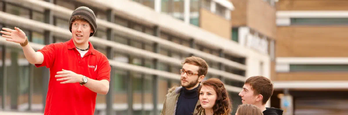 Tour guides leading a university tour