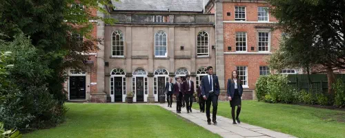 Students walking out of a school building