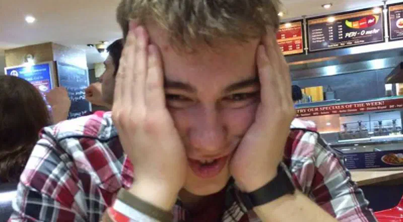 The author pulling a face in a takeaway