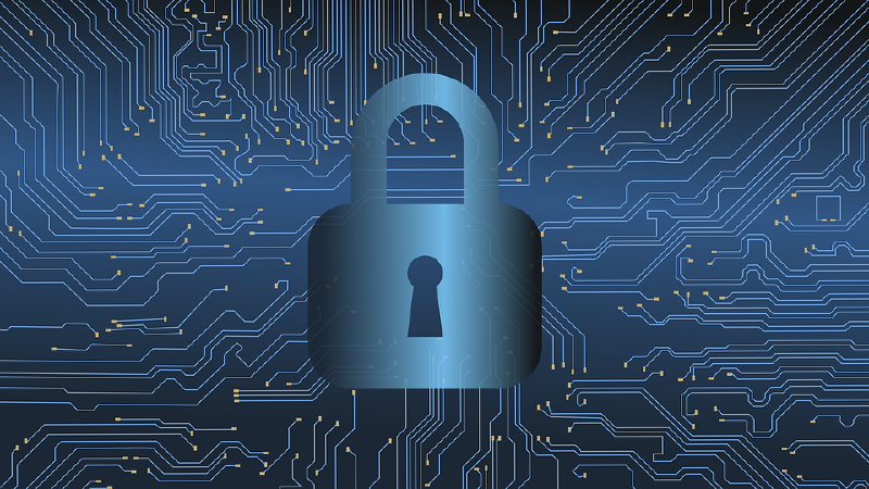 A padlock in front of circuit board imagery