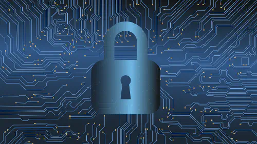 A padlock in front of circuit board imagery